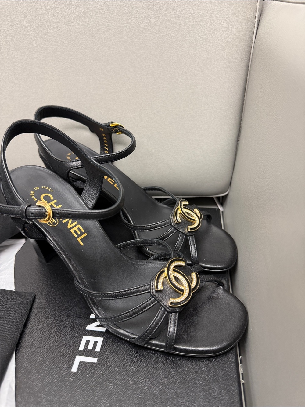 CHANEL Black Leather Slingback Heels with Gold CC Emblem